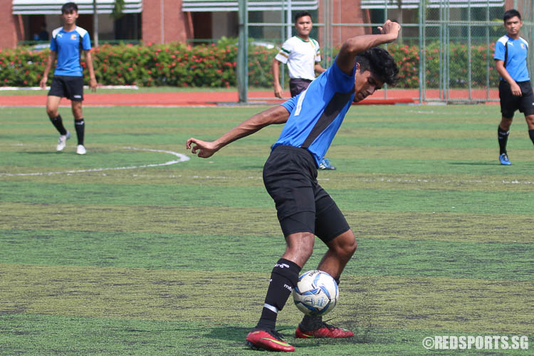 Ayyadarshan (ACJC #14) controls the ball against SRJC. (Photo © Chua Kai Yun/Red Sports)