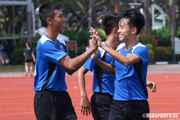 ACJC players celebrate as Eldon Foo (#20) sealed a goal. (Photo © Chua Kai Yun/Red Sports)