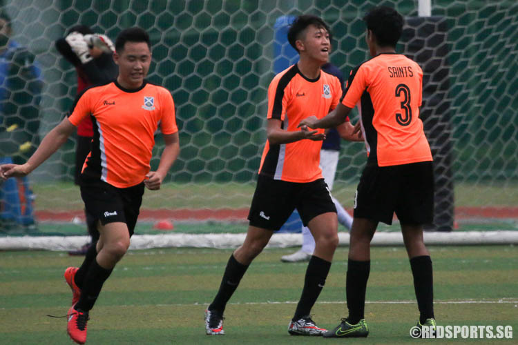 Players from Saint Andrew's Junior College celebrates after Damian Ong (SAJC #10, middle) completes a hat-trick. (Photo © Chua Kai Yun/Red Sports)