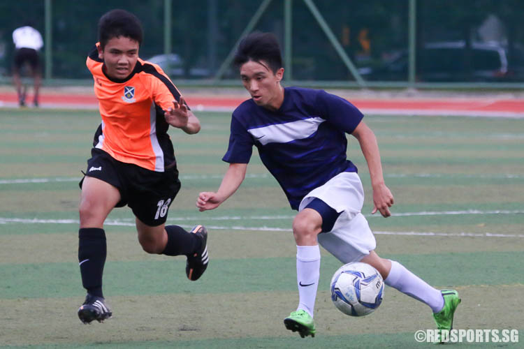 PJC #9 dribbles against SAJC #18. (Photo © Chua Kai Yun/Red Sports)