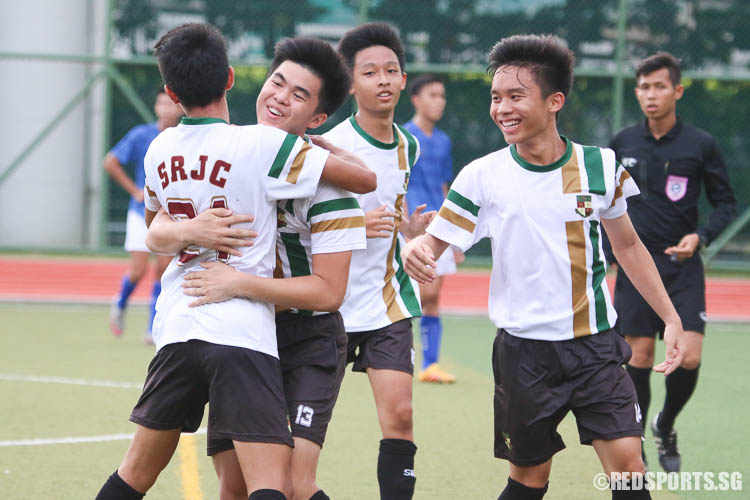 Players from Serangoon Junior College celebrate as Jove Liew (#21) scores their third goal. (Photo © Chua Kai Yun/Red Sports)