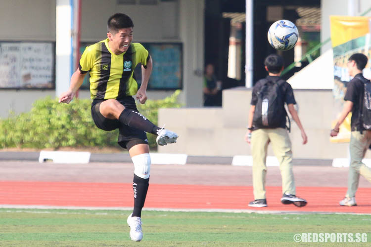 Wang Yaning (TJC #22) clears the ball. (Photo © Chua Kai Yun/Red Sports)