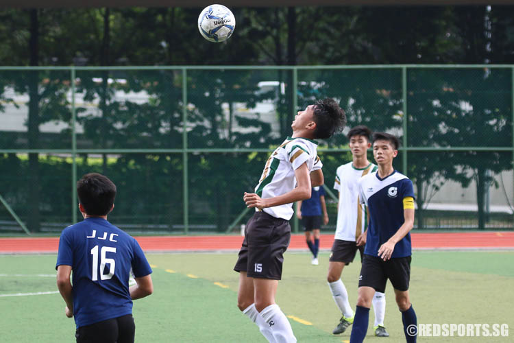 Bryan Goh (SRJC #15) jumps for the ball. (Photo © Chua Kai Yun/Red Sports)