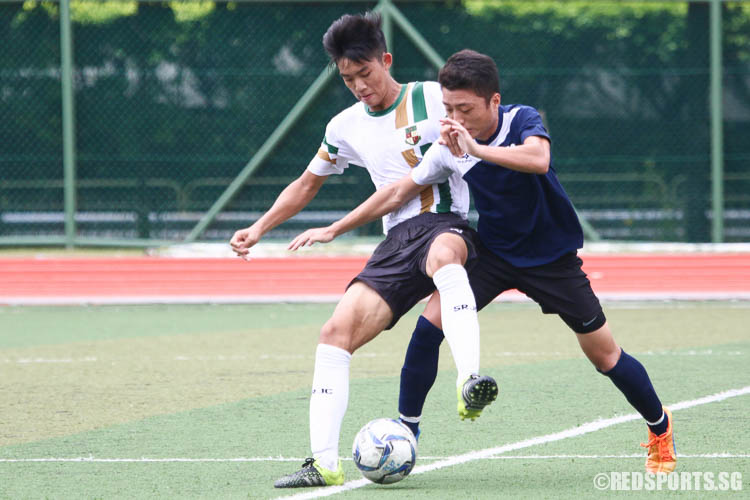 Astenn Mun (SRJC #10) controls the ball against Chang Jia Jung (JJC #8).  (Photo © Chua Kai Yun/Red Sports)