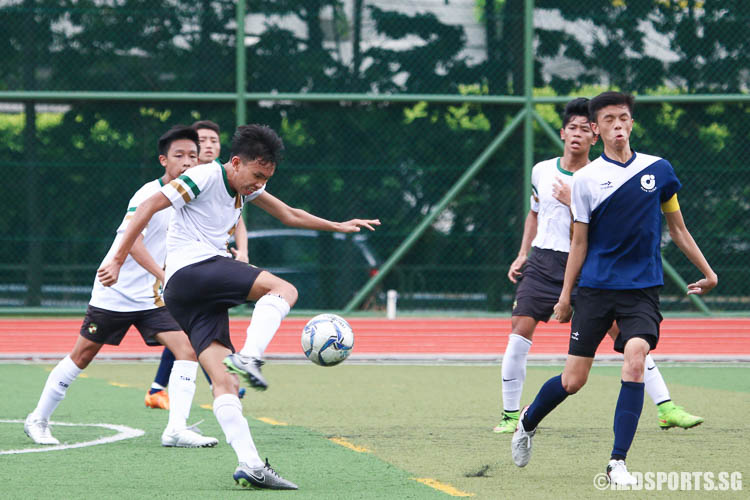 Bryan Goh (SRJC #15) fires a kick. (Photo © Chua Kai Yun/Red Sports)