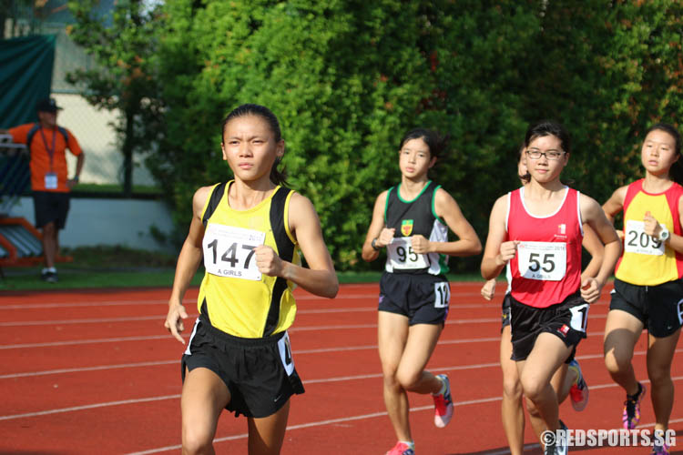 Nicole Low (#147) of VJC leading the pack at the start of the 2000m steeplechase. (Photo © Chua Kai Yun/Red Sports)