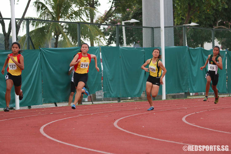 Athletes in action during the A-Girls 200m event. (Photo © Chua Kai Yun/Red Sports)