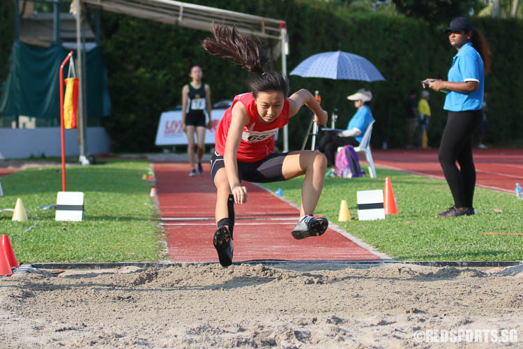 Yoo Yi Jie (#65, NJC) jumped with a 9.82m effort. (Photo © Chua Kai Yun/Red Sports)