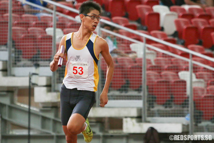 Nicholas Lian (#53) of Catholic High starting the second leg of the 4x400m relay. (Photo © Chua Kai Yun/Red Sports)