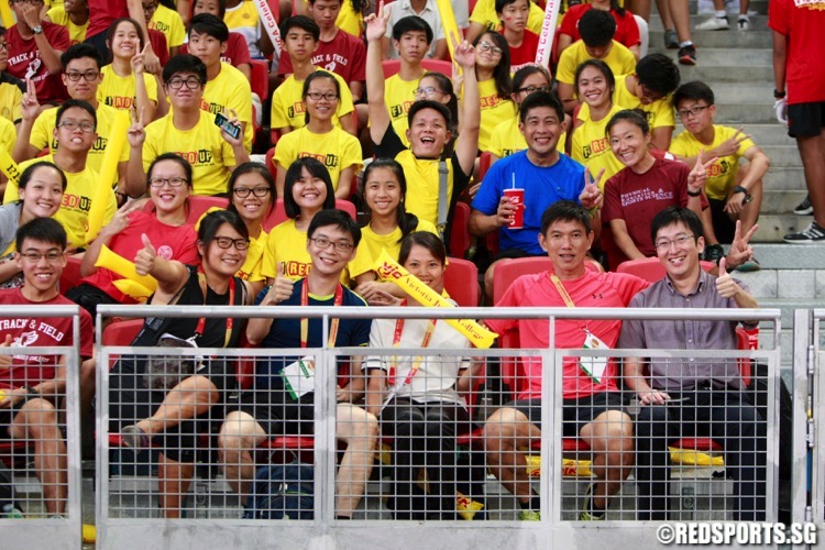 Tan Yew Hwee (second from right, front), the PE HOD of VJC with fellow teacher Evelyn Teoh (second from left, front) and other VJC supporters at the National Stadium.  (Photo © Les Tan/Red Sports)