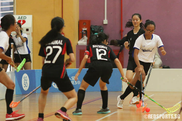 Manisha Magar (CJC #11) steers the ball away from NJC. (Photo © Chua Kai Yun/Red Sports)