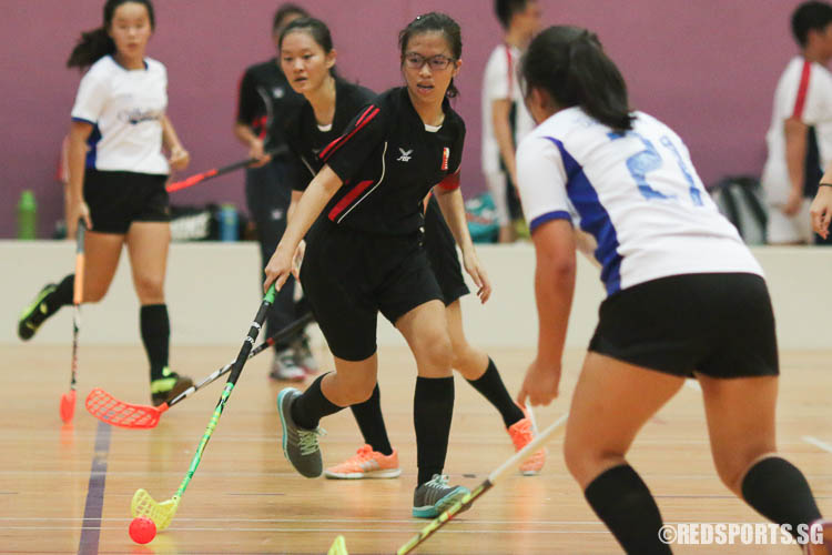 Chew Sze Lynn  (#12) of NJC steers the ball towards goal. (Photo © Chua Kai Yun/Red Sports)