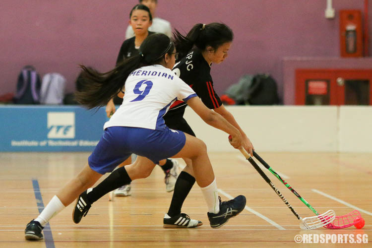 Charmaine Neo (TPJC #10) controls the ball aaginst Sakinah (MJC #9). (Photo © Chua Kai Yun/Red Sports)