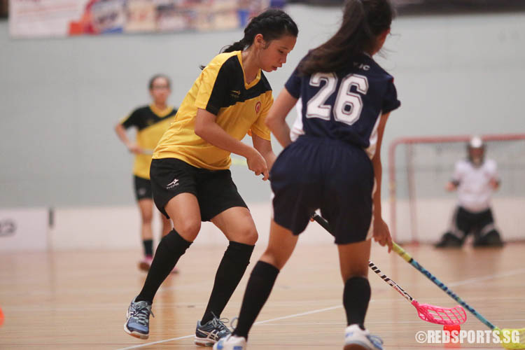 Jesslyn Peh (#19) controls the ball against YJC. (Photo © Chua Kai Yun/Red Sports)