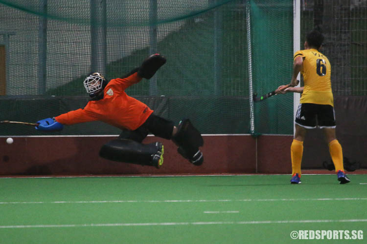 Keane Kwa (RI #20) attempts to block the penalty but was unsuccessful. (Photo © Chua Kai Yun/Red Sports)