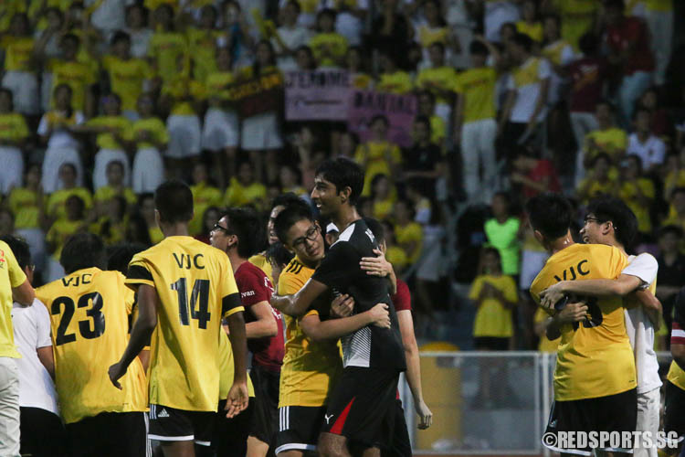 A VJC player comforting Asaad Khalique (RI #11). (Photo © Chua Kai Yun/Red Sports)