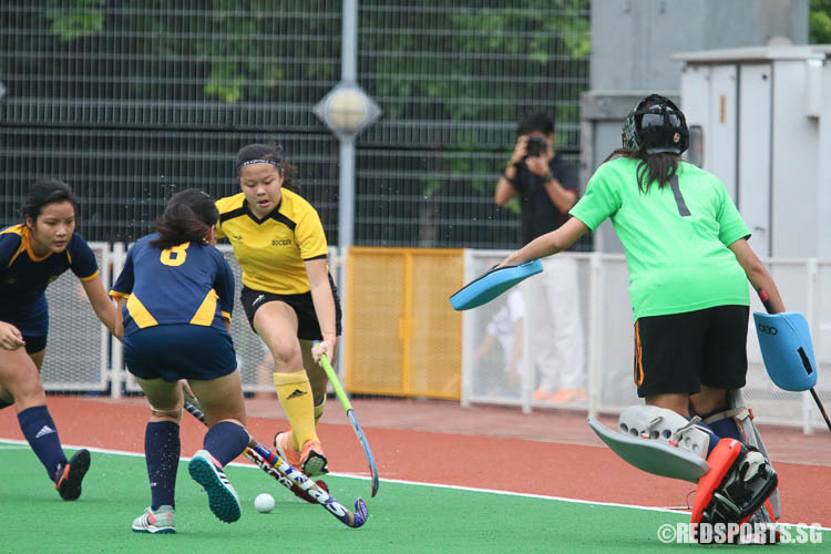 Claresta Yeo (#9) of VJC finds herself surrounded by ACJC defenders. (Photo © Chua Kai Yun/Red Sports)