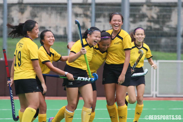 VJC players in celebration as Claresta Yeo (#9, third from left) slots in the team's 5th goal. (Photo © Chua Kai Yun/Red Sports)