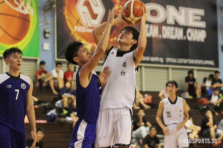 AJC player attempts to land a basket.(Photo © Ryan Lim/Red Sports)