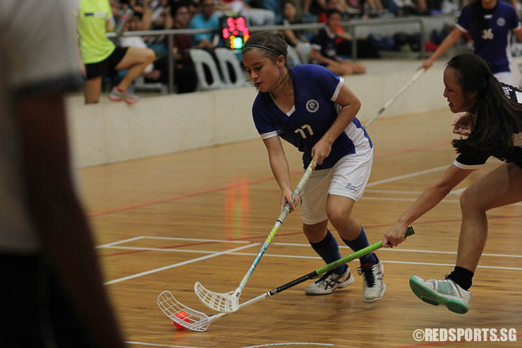 Thomson May (MJC #77) attempts to dribble past her opponent. (Photo 8 © Ryan Lim/Red Sports)