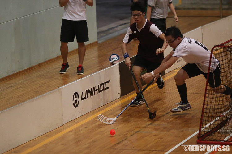Players taking the game behind the goalposts. (Photo © Ryan Lim/Red Sports)