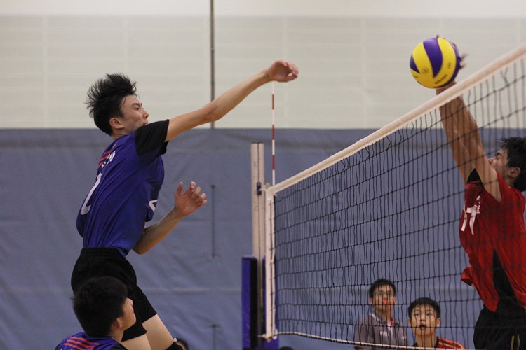 St. Hilda's Secondary Team A beat Shuqun Secondary in straight sets (25-18, 25-21) to finish unbeaten over eight games. (Photo 26 © Ryan Lim/Red Sports)