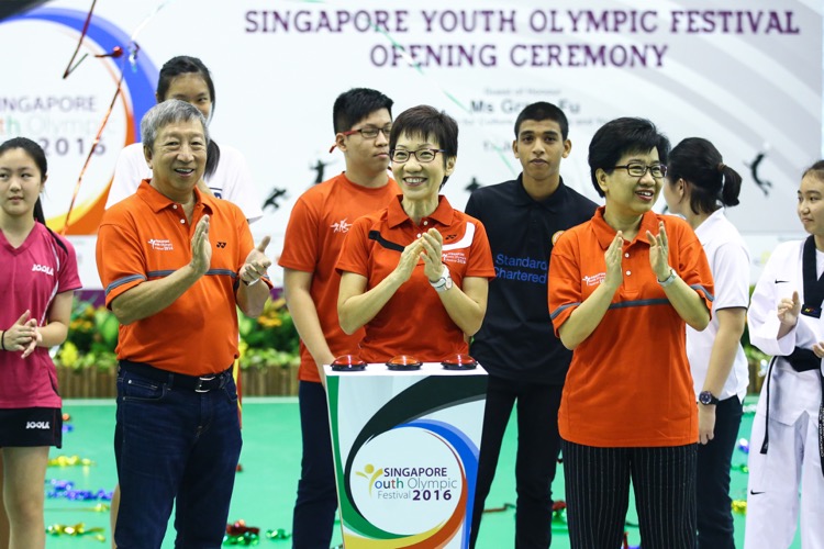 Minister of Culture, Community and Youth Grace Fu (C) launches the Singapore Youth Olympic Festival 2016 at Anglican High School on June 17, 2016 in Singapore.