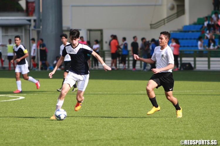 Siglap (white) came from 1-3 down to beat St Gabriel's 5-3 after extra time to grab third place in the National B Division Football Championship. (Photo © Les Tan/Red Sports)