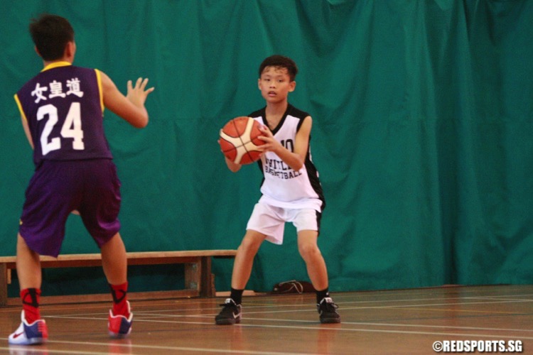 Queensway (purple) beat Whitley 53-35 to finish Round 1 with a 2-1 win-loss record. They also qualified for Round 2. (Photo © Les Tan/Red Sports)