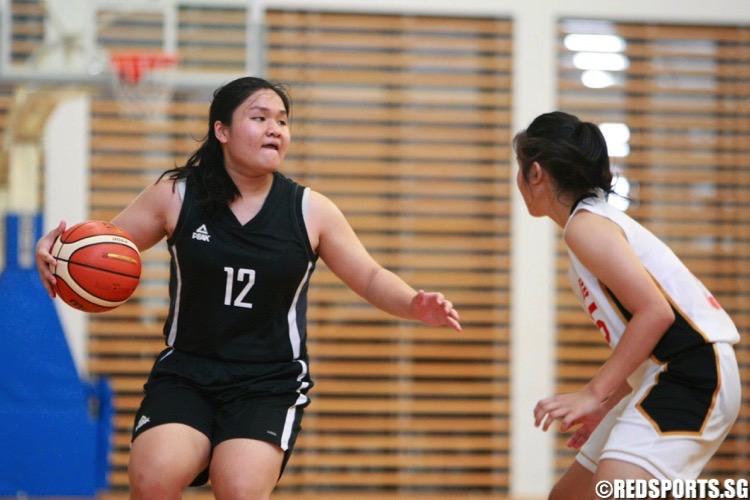 SCGS (black) beat defending champions Jurong Secondary 64-44 to win the National C Division Basketball Championship. (Photo © Les Tan/Red Sports)