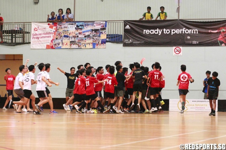 Catholic High celebrate their win. (Photo © Les Tan/Red Sports)