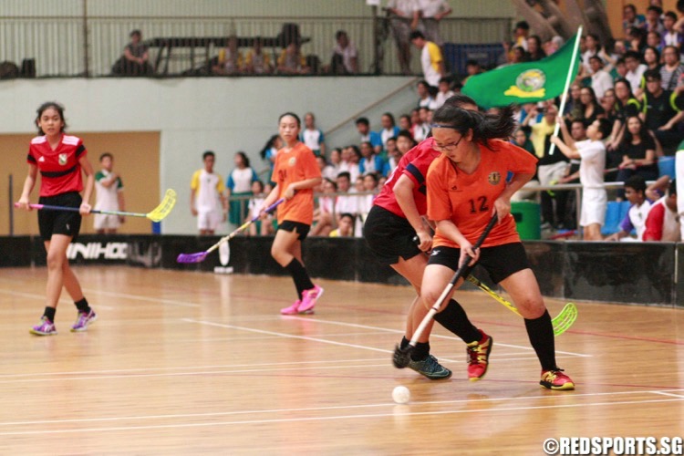 Tanjong Katong (orange) beat St. Margaret's 7-3 to retain the National C Division Girls Floorball Championship. (Photo © Les Tan/Red Sports)