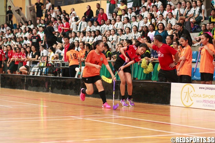 Tanjong Katong (orange) beat St. Margaret's 7-3 to retain the National C Division Girls Floorball Championship. (Photo © Les Tan/Red Sports)