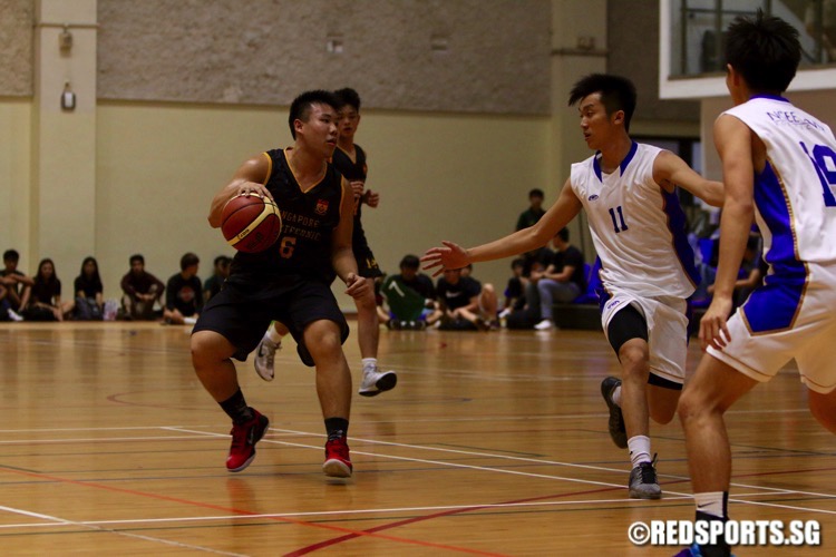 Ngee Ann Polytechnic (white) beat Singapore Polytechnic 49-42 for their first win in the POL-ITE Basketball Championship. (Photo © Les Tan/Red Sports)