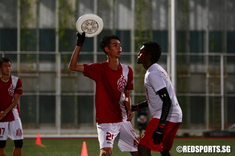Nanyang Poly (white top) defeated Temasek Poly 10-8 in the gold medal game to win the POL-ITE Ultimate Championship. (Photo © Les Tan/Red Sports)