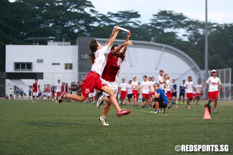 Nanyang Poly (white top) defeated Temasek Poly 10-8 in the gold medal game to win the POL-ITE Ultimate Championship. (Photo © Les Tan/Red Sports)