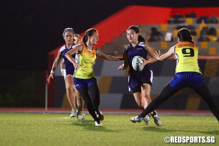 Nanyang Poly (blue) beat Singapore Poly 7-1 in their opening game of the POL-ITE Touch Football Championship. (Photo © Les Tan/Red Sports)