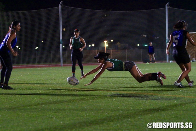 Republic Poly (green) beat ITE 8-0 to win their opening game of the POL-ITE Touch Football Championship. (Photo © Les Tan/Red Sports)