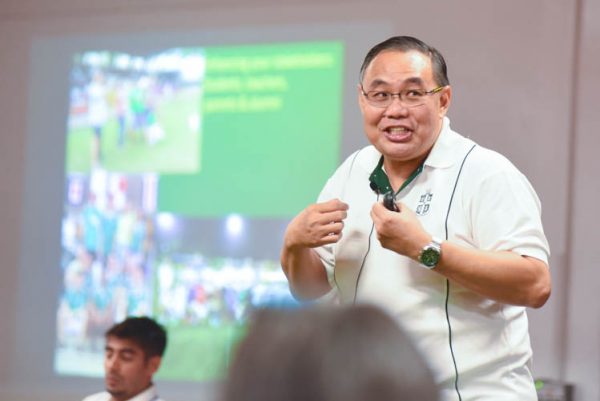 Mr Bernard Teo, Saint Joseph's Institution’s football teacher-in-charge, speaking during the "Ideas for Change" event organised by the FAS.