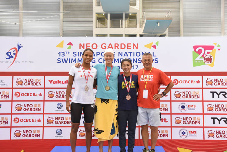 In the Women's 100m Butterfly final on the third day of the 13th Singapore National Swimming Championship, Quah Ting Wen emerged first, with Kenya's Emily Muteti coming in second and Nicholle Toh rounding off the podium. (Photo © Stefanus Ian/Red Sports)