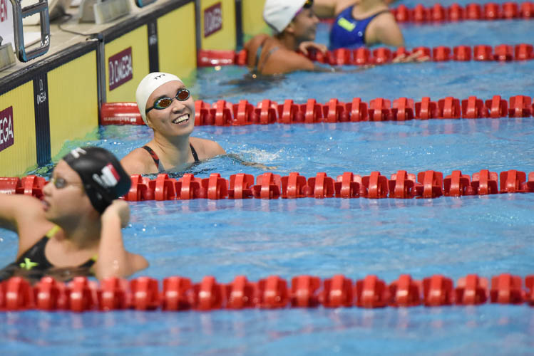 Roanne Ho smiling after finishing first in the Women's 50m Breaststroke final on the third day of the 13th Singapore National Swimming Championship. (Photo © Stefanus Ian/Red Sports)