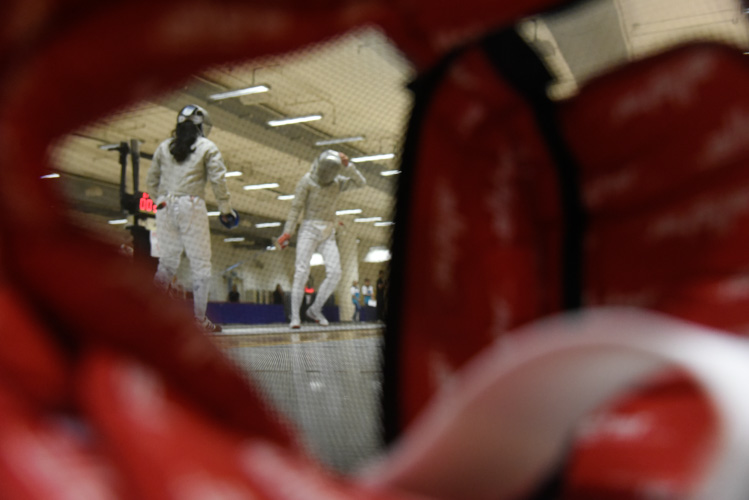 Fencers battling in a bout during the first day of the SYOF. (Photo © Amirah Haris/Red Sports)
