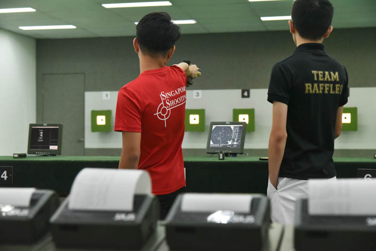 The Air Pistol Men's Y17 category, taking their shots during the competition competition. (Photo ©  Stefanus Ian/Red Sports)