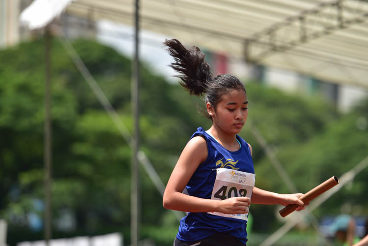 Fafa of Erovra Sports Academy finishing off the final leg of the U-19 4x100m girls relay race. Erovra Sports Academy clinched gold with a time of 54.71s while Bukit Batok Secondary came in second with 58.91s and Bishan Park took the bronze with a time of 1:01.93s. (Photo 1 © Stefanus Ian/Red Sports)