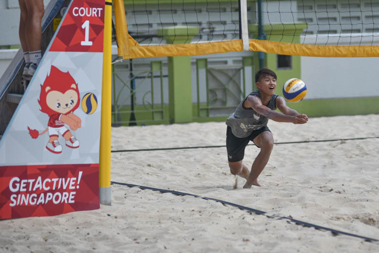 One of STAN's players attempting to cushion the volleyball during their match against Bishan East B. STAN won the match 15-5, 15-8. (Photo 1 © Stefanus Ian/Red Sports)