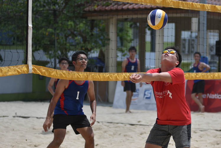 One of Anderson's players attempting to cushion the volleyball during their match against Bishan East B. Anderson won the match 15-9, 13-15, 15-11. (Photo 1 © Stefanus Ian/Red Sports)