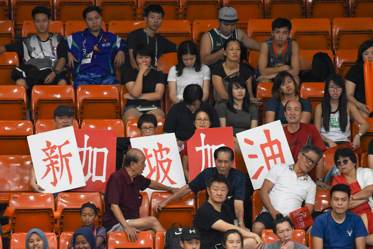 Hiroshi Yosida, Lynda Dyeo, Lim Phang Boon and Ann Lim holding support signs for Team Singapore during a basketball match. (Photo 1 by Stefanus Ian/Sport Singapore)