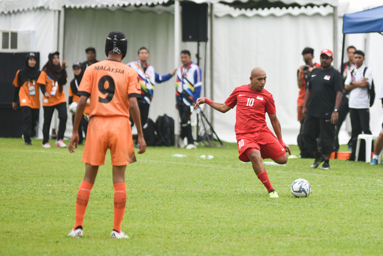 Khairul Anwar scoring Singapore's second goal of the match from a free kick.