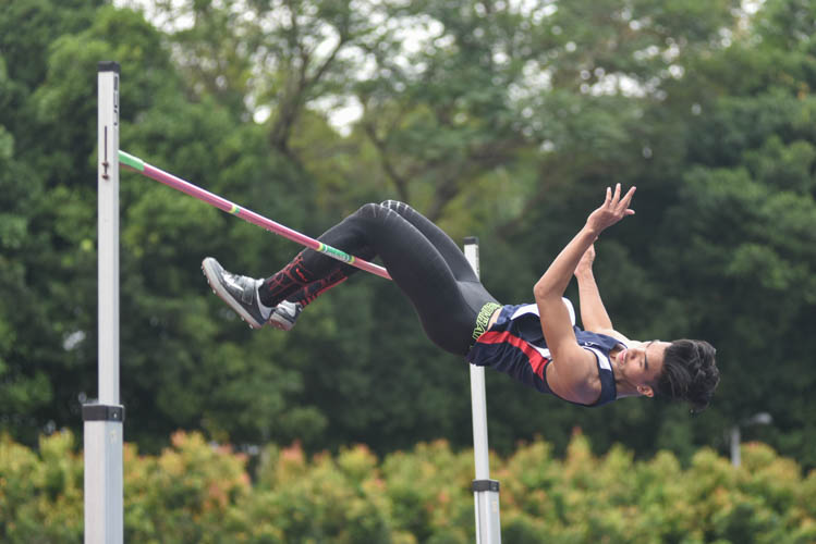 Nanyang Polytechnic’s Hairul Syamil Bin Mardan in action during the Men's High Jump event. He clinched first place with a height of 2.02m. 