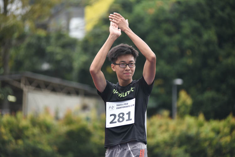 Republic Polytechnic’s Ryan Teo applauding his supporters during the Men's High Jump event during the 2018 IVP Track and Field competition. (Photo 16 © Eileen Chew)